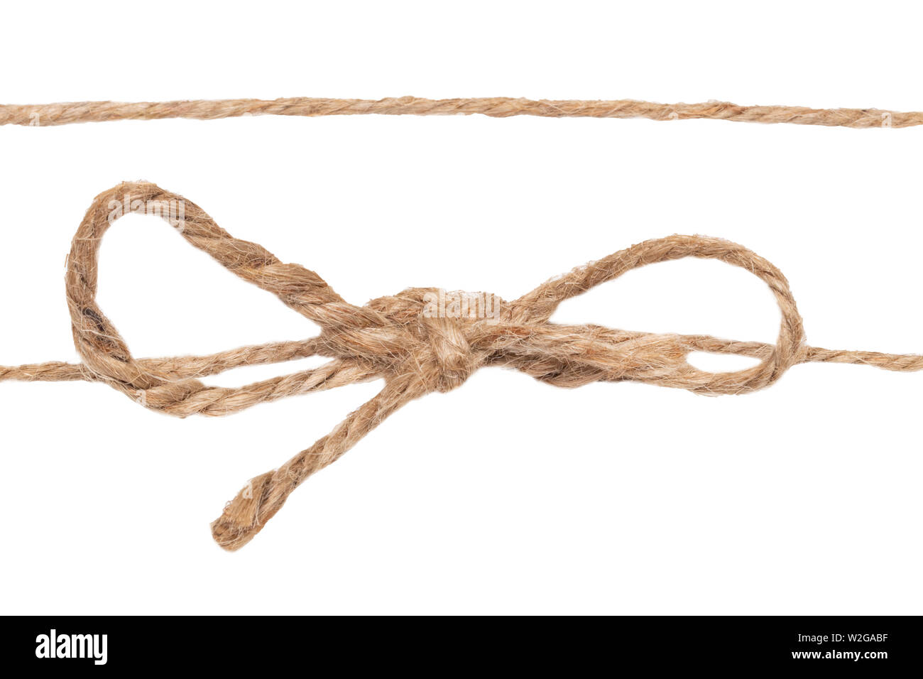 Closeup of twine node or knot with bow and one rope isolated on a
