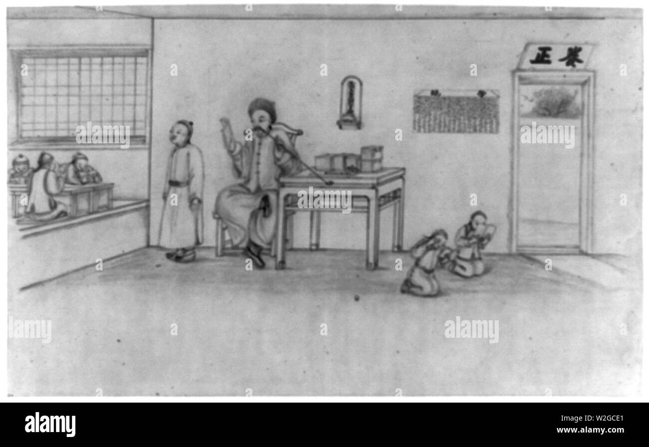 Chinese primary school classroom with teacher, smoking a long pipe, and ...