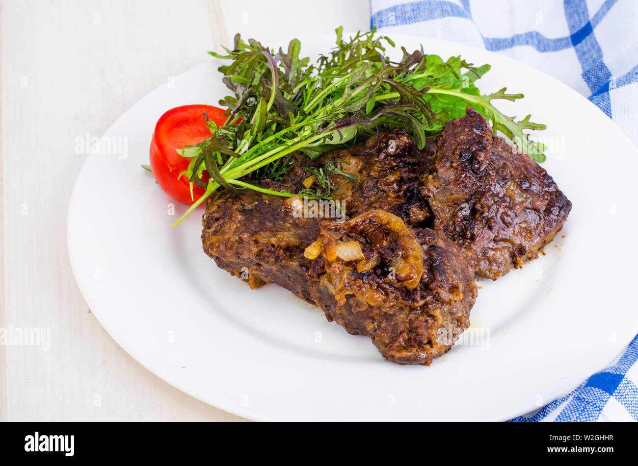 Fried beef liver with lettuce mix Stock Photo Alamy