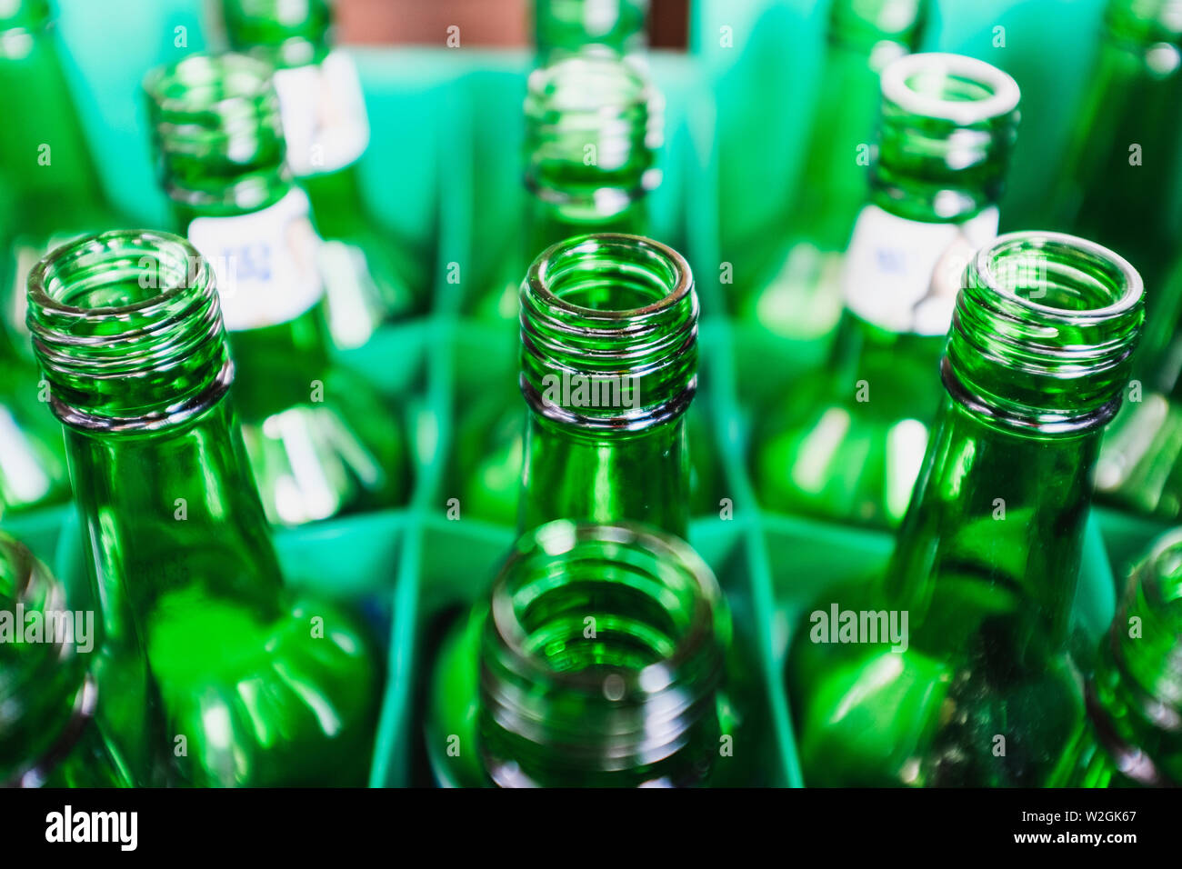 A shot of empty glass bottles ready to be recycled Stock Photo - Alamy