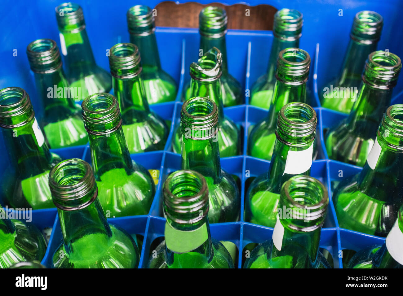 A shot of empty glass bottles ready to be recycled Stock Photo - Alamy