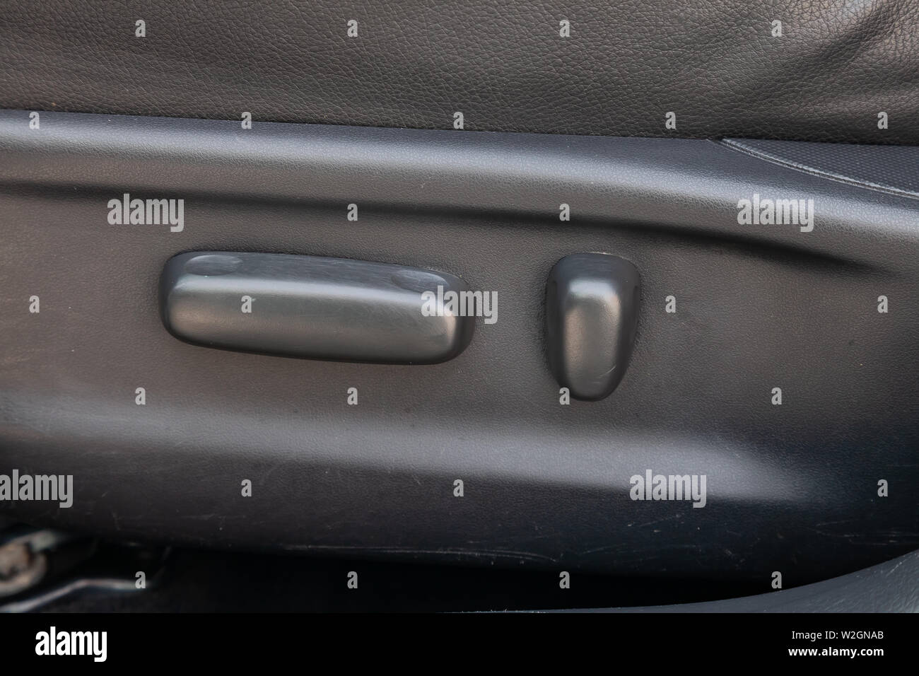 Novosibirsk, Russia - 07.09.2019: View to the interior of Toyota Camry 2006 with dashboard, front seats, gray leather and adjust buttons after cleanin Stock Photo