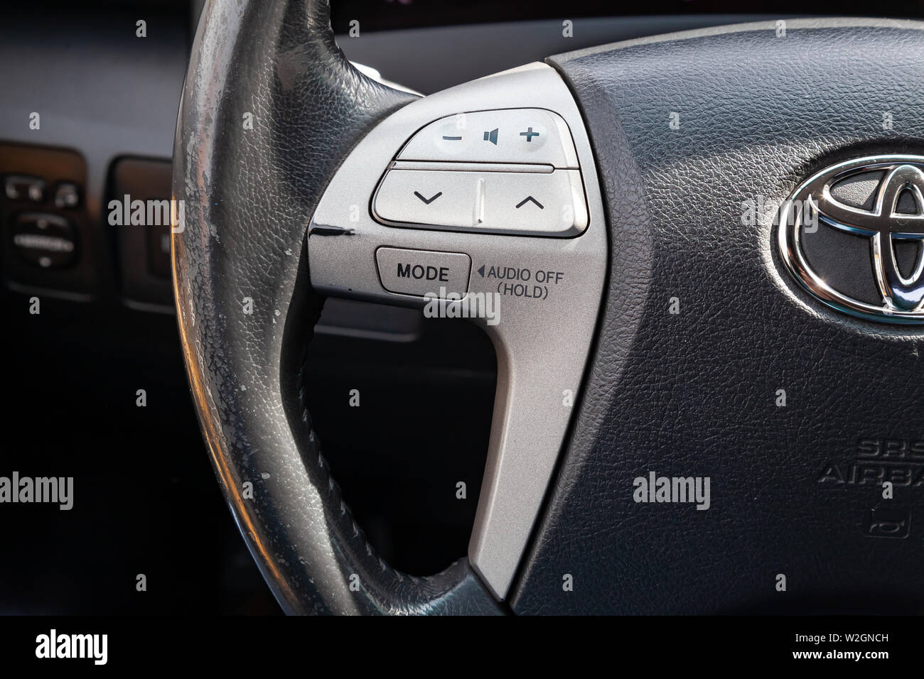 Novosibirsk, Russia - 07.09.2019: View to the interior of Toyota Camry 2006 with steering wheel with audio control buttons after cleaning before sale Stock Photo