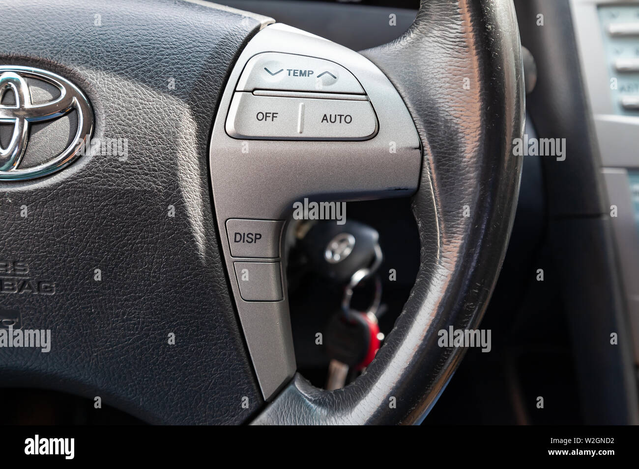 Novosibirsk, Russia - 07.09.2019: View to the interior of Toyota Camry 2006 with dashboard,steering wheel with climate-control buttons after cleaning Stock Photo