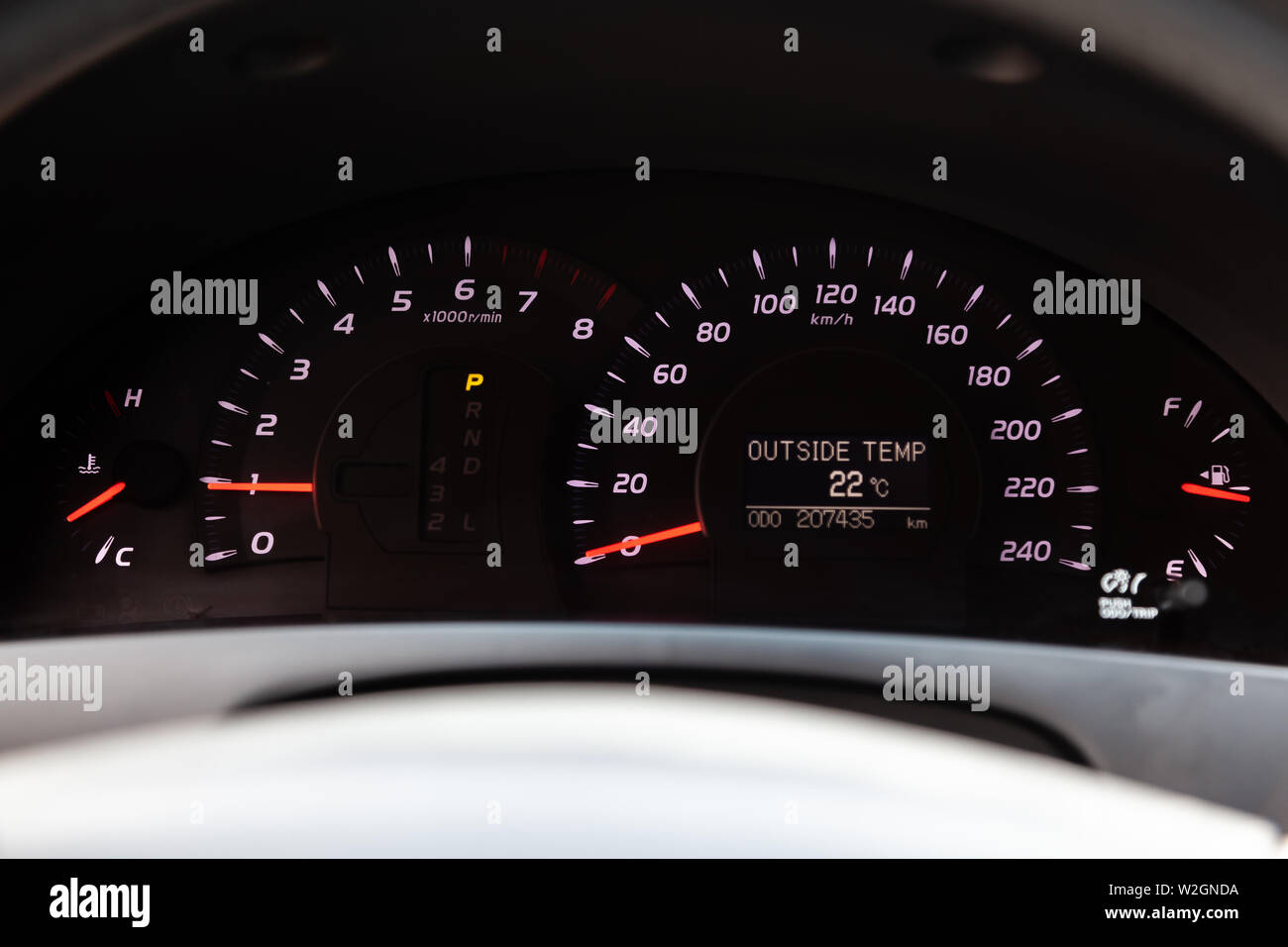 Novosibirsk, Russia - 07.09.2019: View to the interior of Toyota Camry 2006 with dashboard, speedometer, odometer, tachometer and red arrows after cle Stock Photo