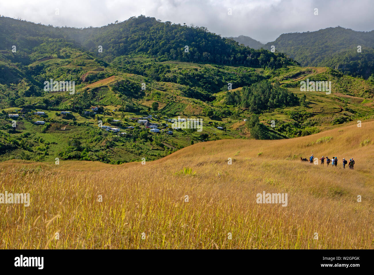 Hikers above the highlands village of Naga Stock Photo
