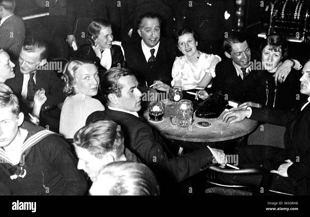 Eva Braun Photo Collection - Album 1 - German men and women out for an evening in fun at a club ca. 1930s Germany Stock Photo