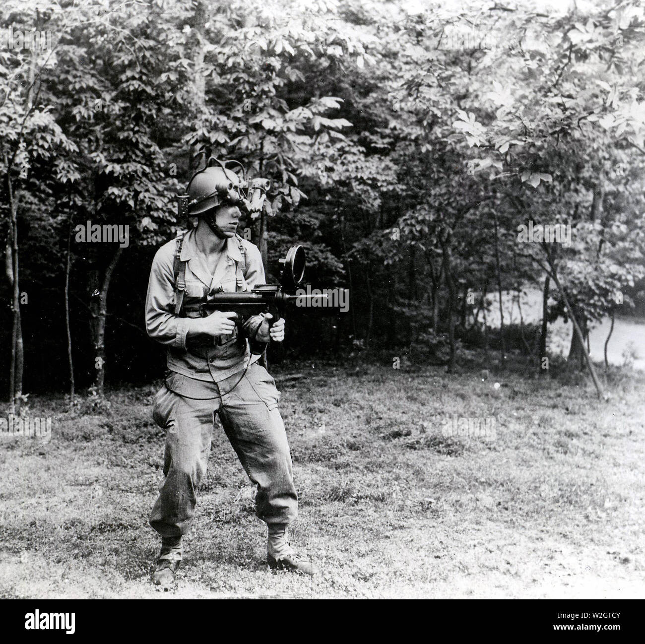 This Soldier Is Equipped With Night Viewing Helmet And Sniperscope Mounted On A M 3 Sub Machine Gun Fort Belvoir Va Stock Photo Alamy