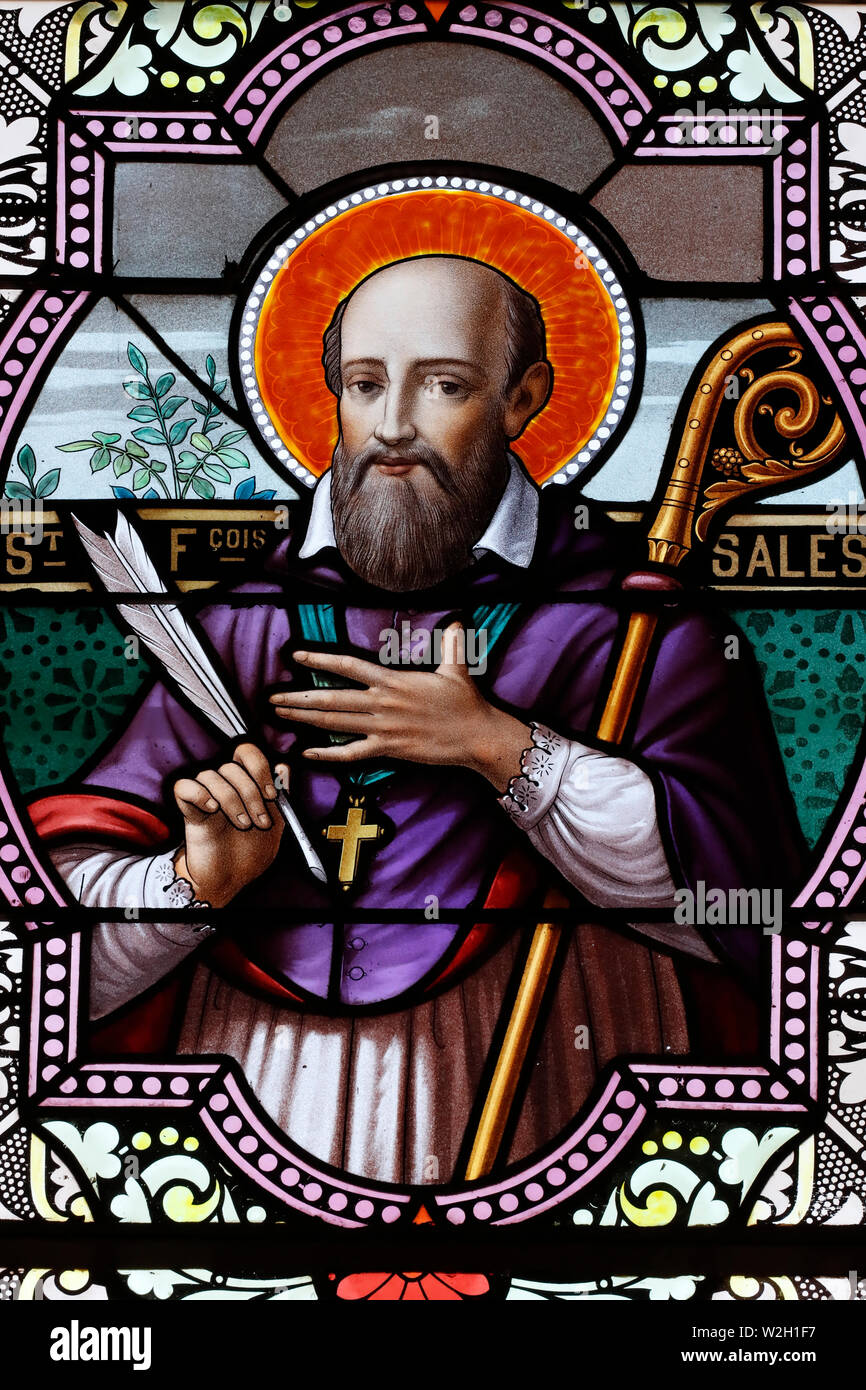 St Francis de Sales. Stained glass window. Combloux. France Stock Photo