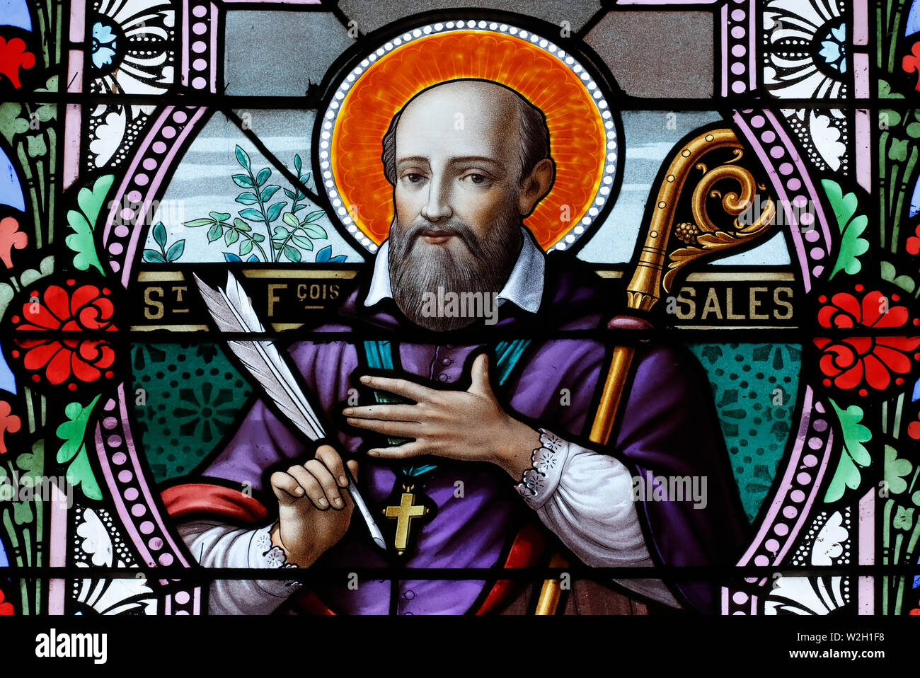 St Francis de Sales. Stained glass window. Combloux. France Stock Photo