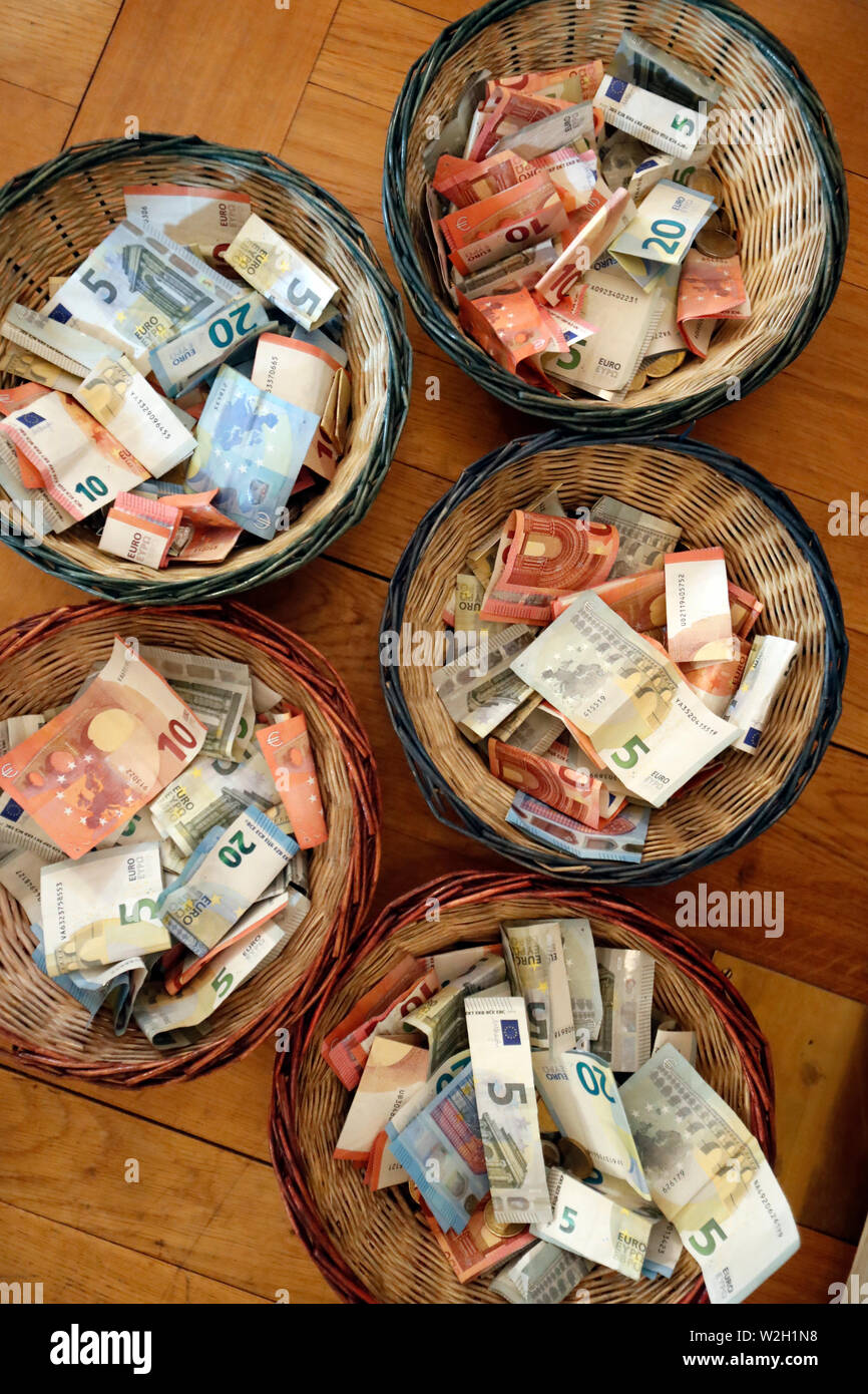 Collection During a Catholic Mass. Basket with Euros. France Stock Photo -  Alamy