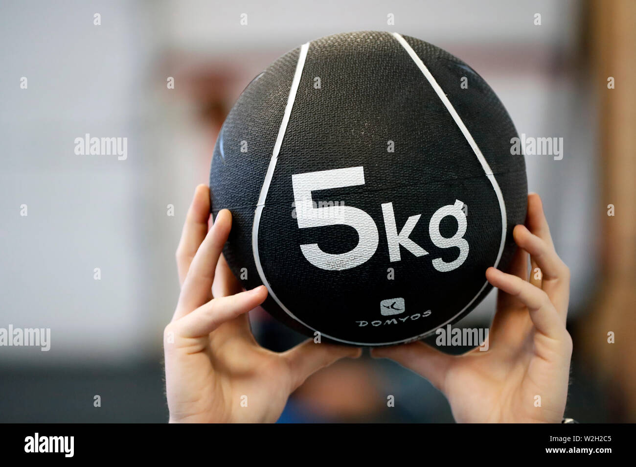 Health club. Man exercising with medicine ball. France Stock Photo Alamy