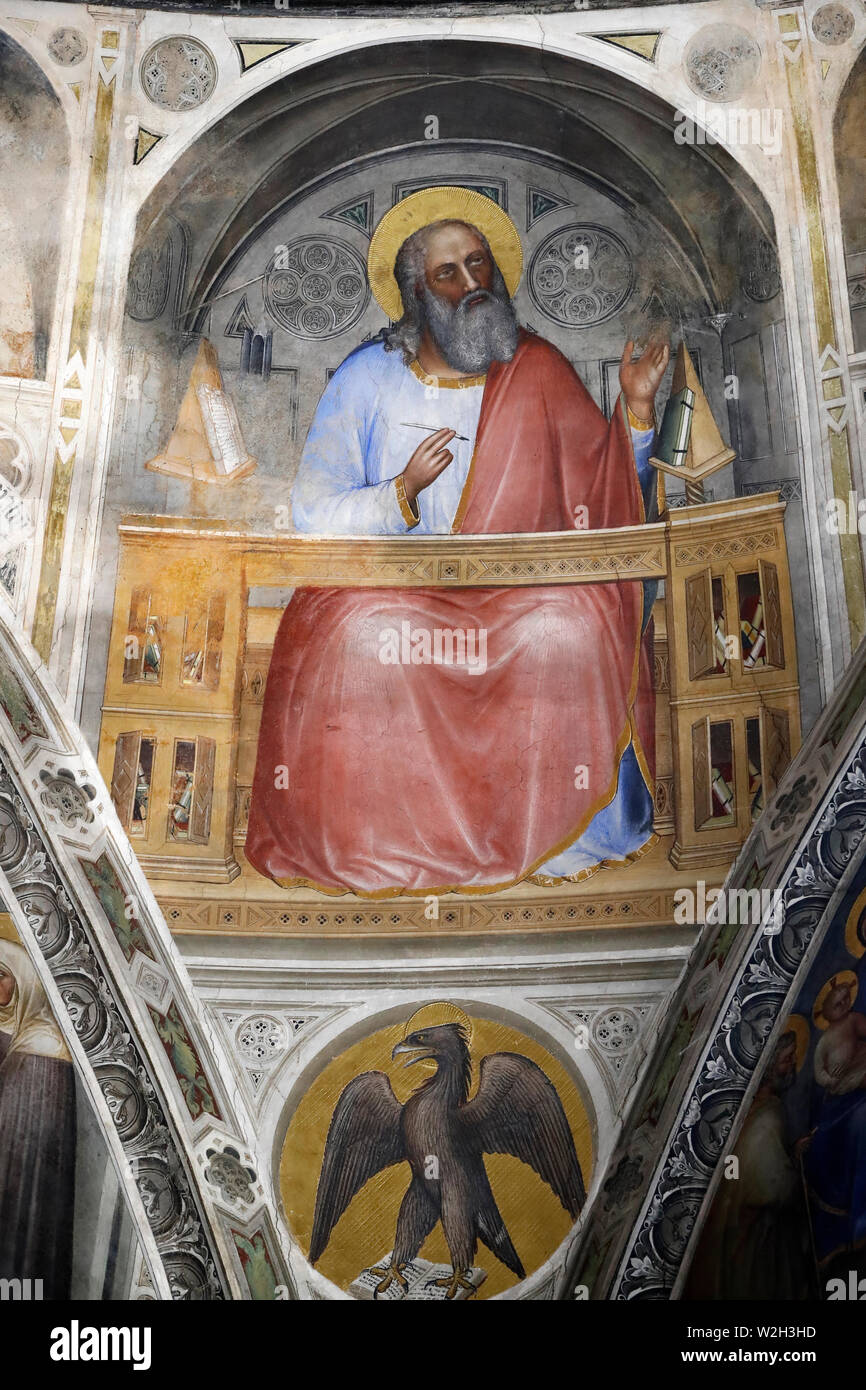 John the Apostle with the eagle.  The Padua Baptistery. Ceilling frescoes  14th century by Giusto de Menabuoi.  Padua. Italy. Stock Photo