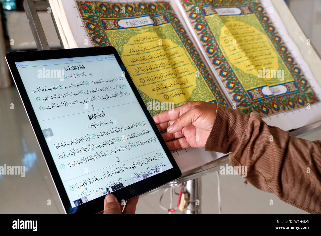 Masjid Nurul Naim mosque. Book with the first page of the Quran and