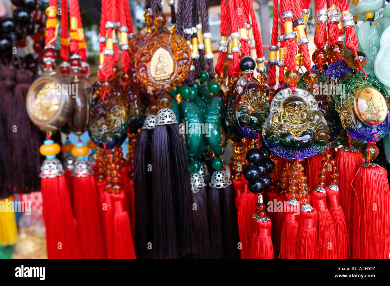 Buddhist good luck charms for sale on market. Vung Tau. Vietnam Stock