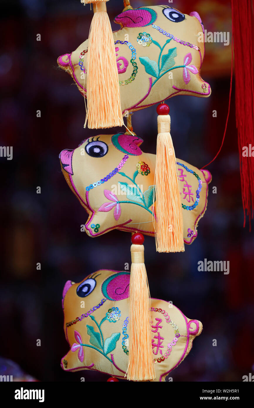 Chinese year of the pig.  New Year pig ornaments for sale  in Cholon.  Ho Chi Minh city. Vietnam. Stock Photo