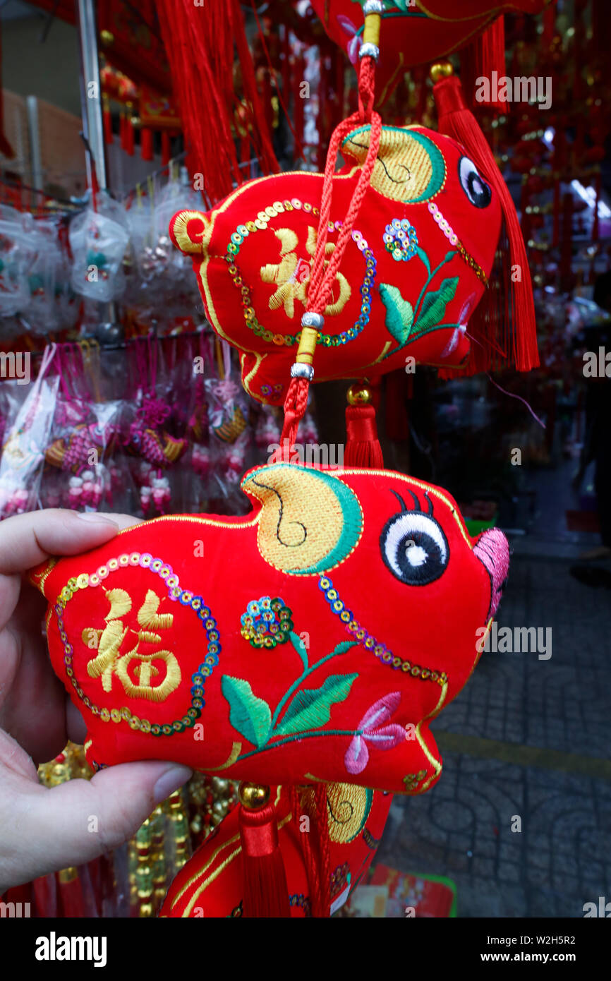 Chinese year of the pig.  New Year pig ornaments for sale  in Cholon.  Ho Chi Minh city. Vietnam. Stock Photo