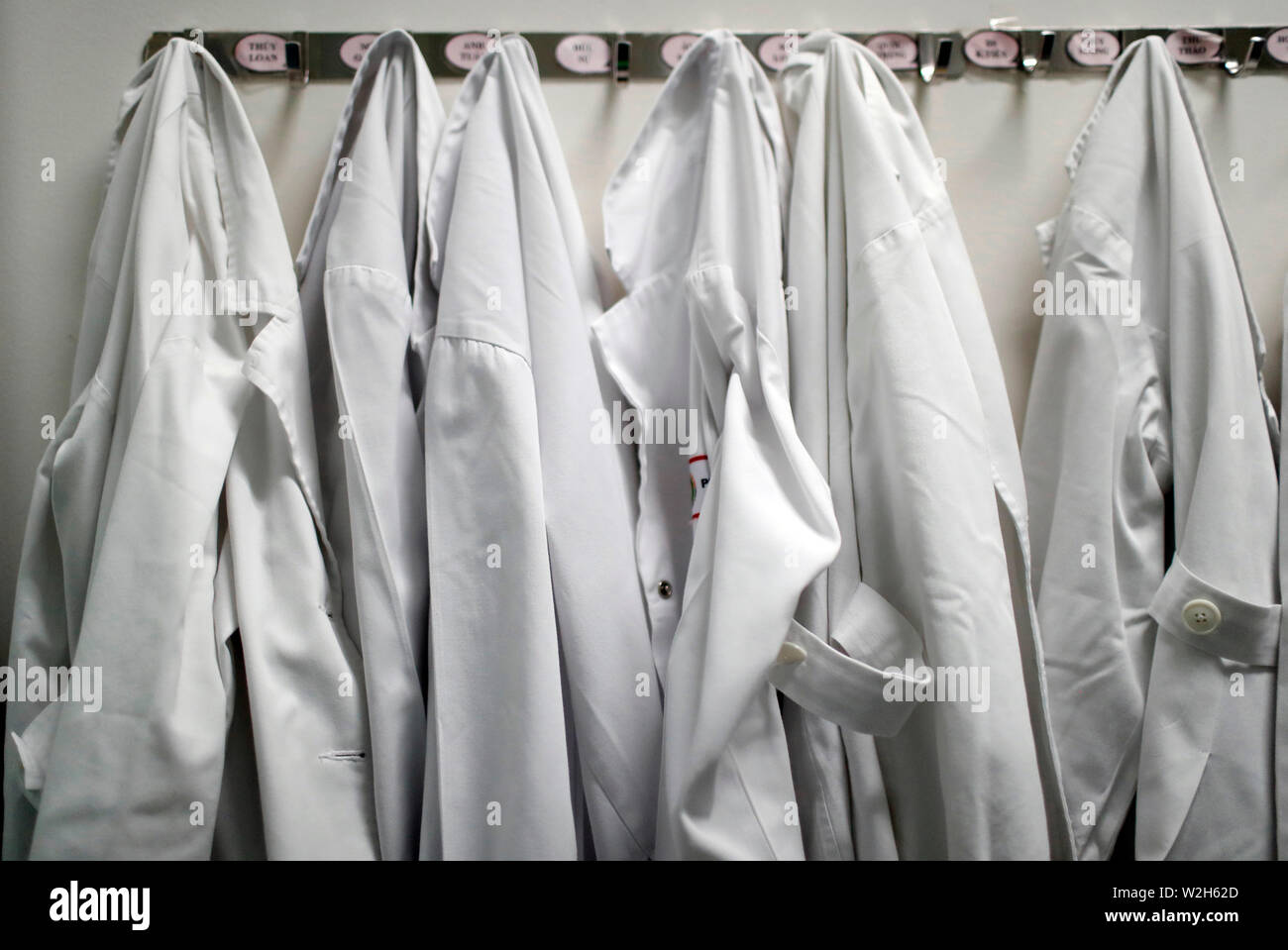 Medical White Long Sleeve  Blouses. Hospital.  Ho Chi Minh city. Vietnam. Stock Photo