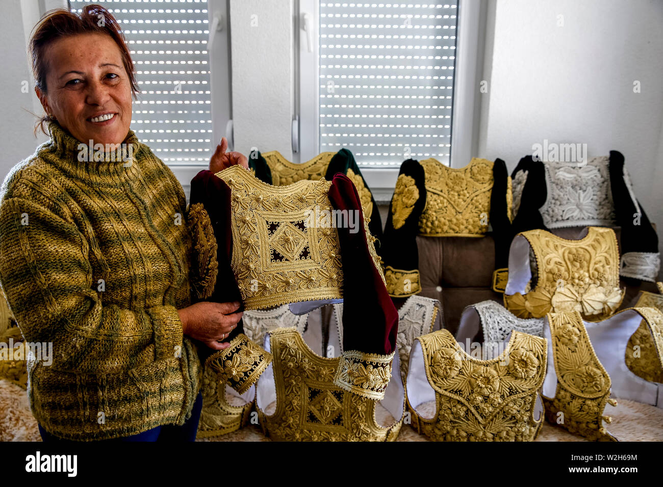 Dickey maker REMZIJE PONXHA, a client of AFK microfinance, in her home in Gjakove, Kosovo Stock Photo