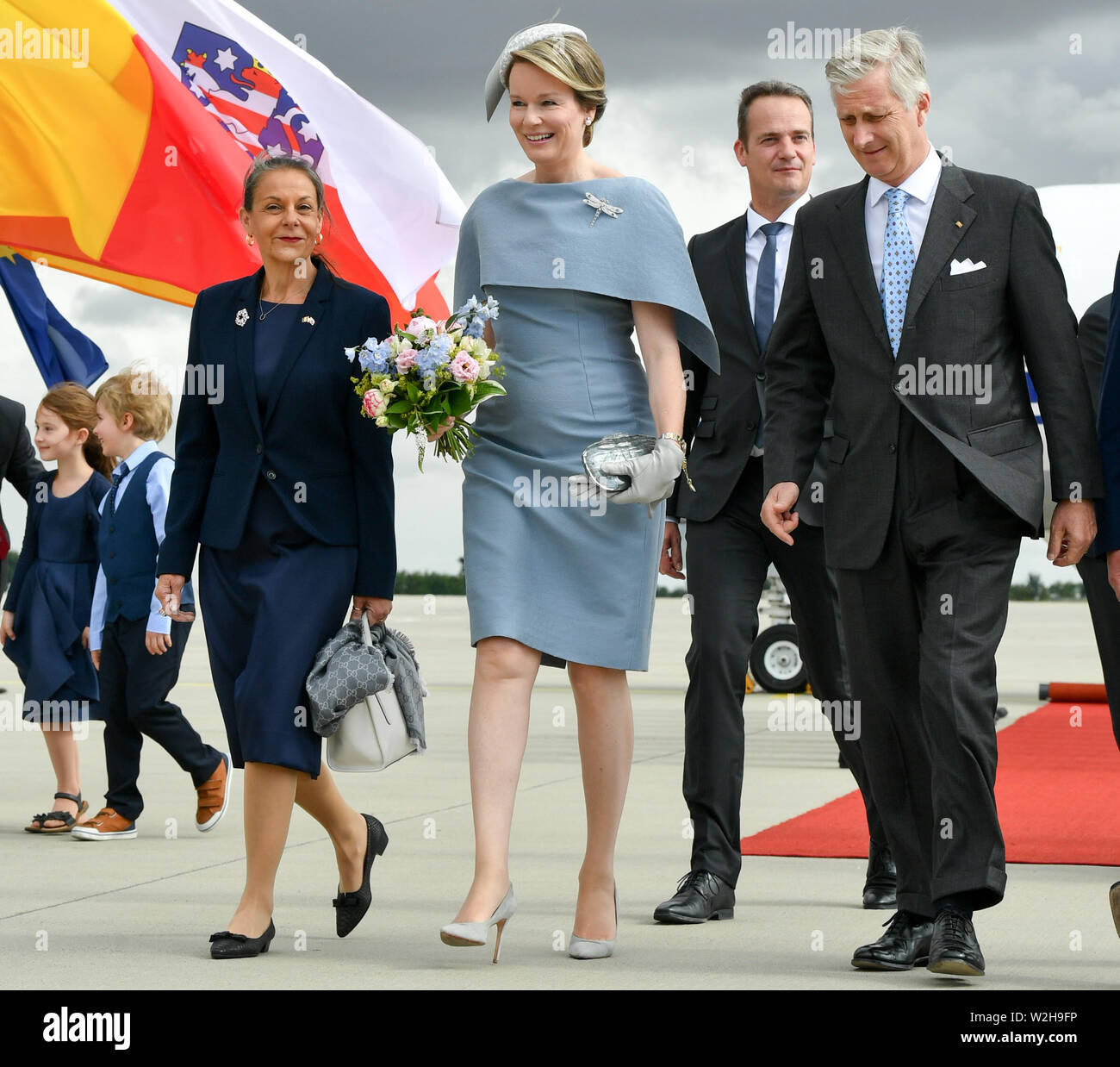 Erfurt, Germany. 09th July, 2019. The Belgian royal couple King Philippe and Queen Mathilde arrive at Erfurt-Weimar airport. Left Germana Alberti vom Hofe, wife of the Thuringian Prime Minister. The royal couple visits Thuringia and Saxony-Anhalt on a two-day journey. Credit: Jens Kalaene/dpa-Zentralbild/dpa/Alamy Live News Stock Photo