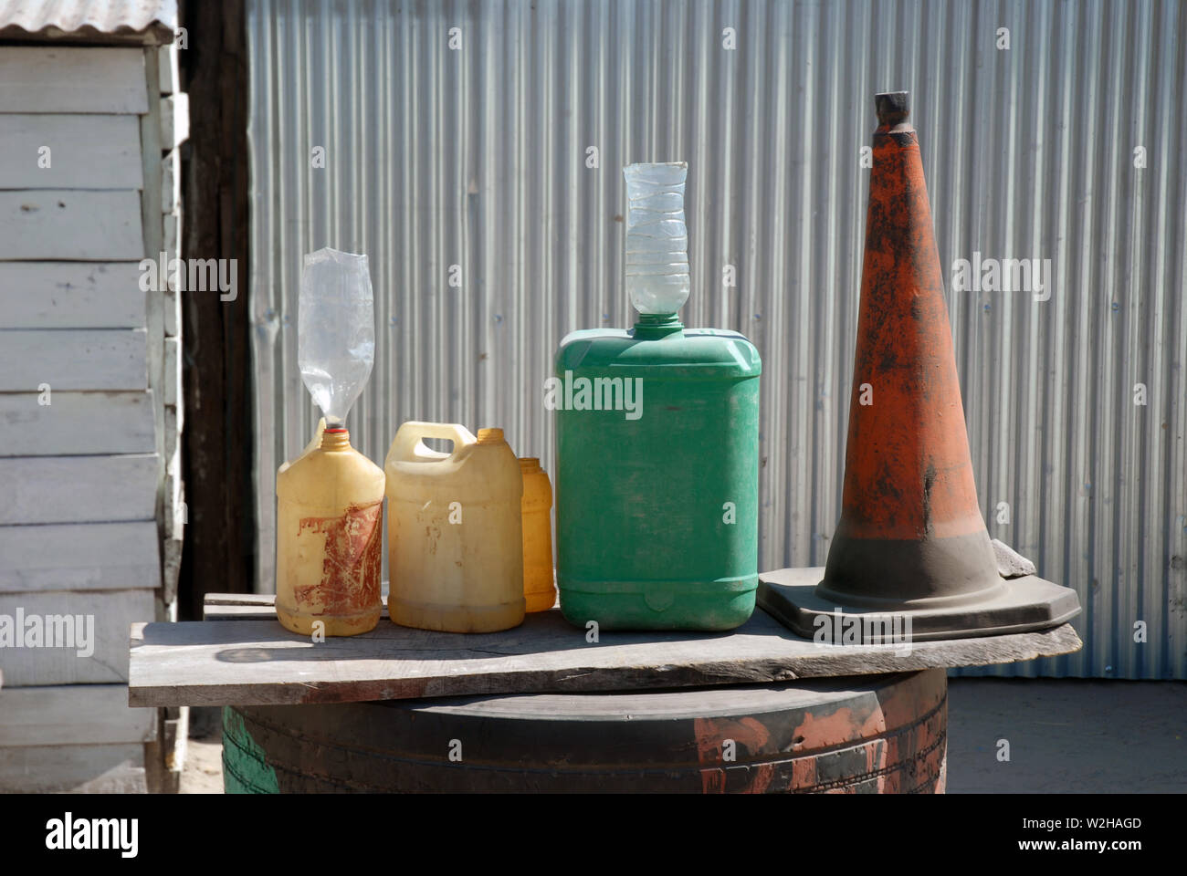 Range of plastic containers holding petrol, Mwandi, Zambia, Africa. Stock Photo