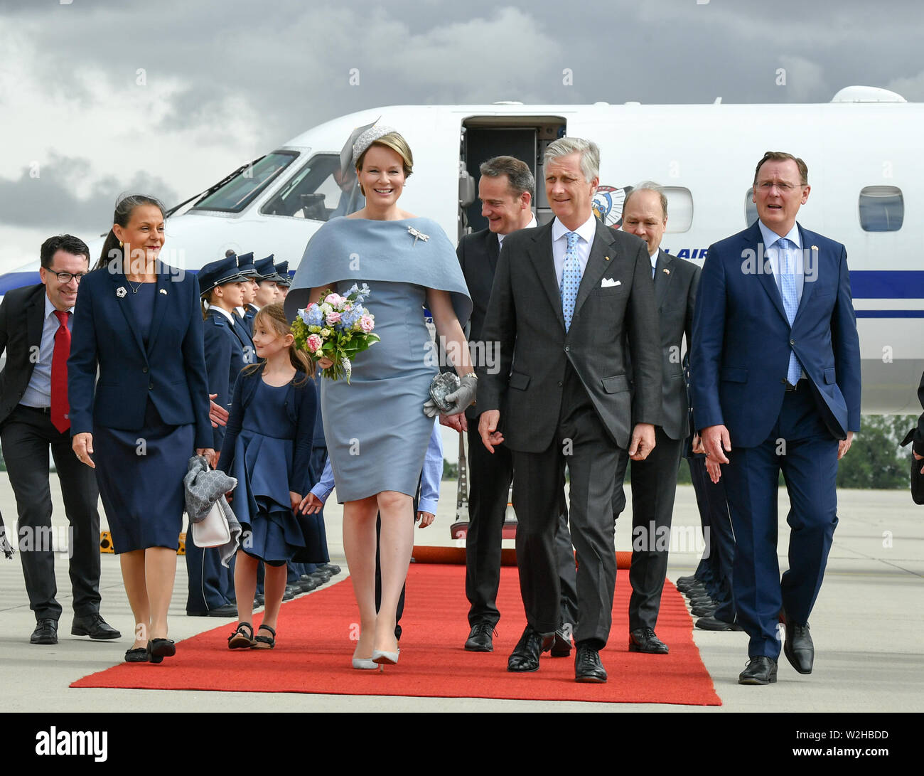 Erfurt, Germany. 09th July, 2019. The Belgian royal couple King Philippe and Queen Mathilde arrive at Erfurt-Weimar airport and are received by Bodo Ramelow (r), Prime Minister of Thuringia, and his wife Germana Alberti from the court (l). The royal couple visits Thuringia and Saxony-Anhalt on a two-day journey. Credit: Jens Kalaene/dpa-Zentralbild/dpa/Alamy Live News Stock Photo