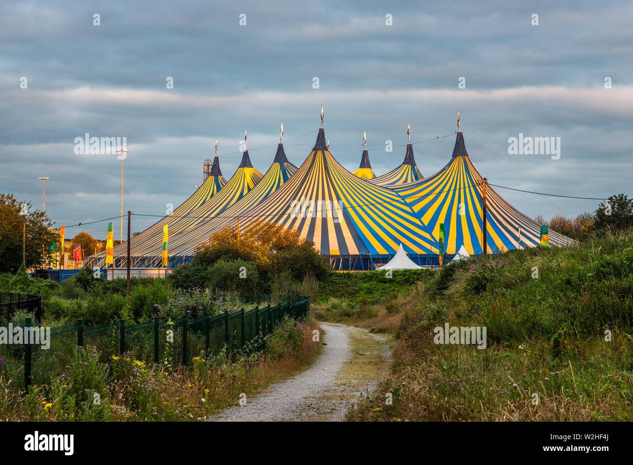 Marina, Cork, Ireland. 09th July, 2019. Early morning light begins ro illuminate the marquee on the Centre Park Road in Cork. Since 2005 the Live at t Stock Photo