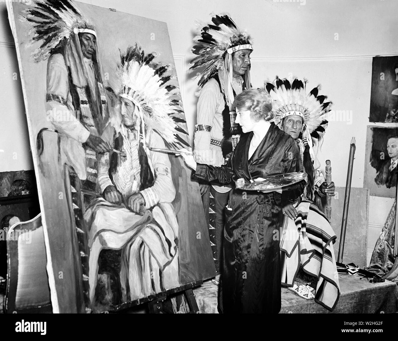 Woman artist Painting portraits of Native Americans ca. 1936 Stock Photo