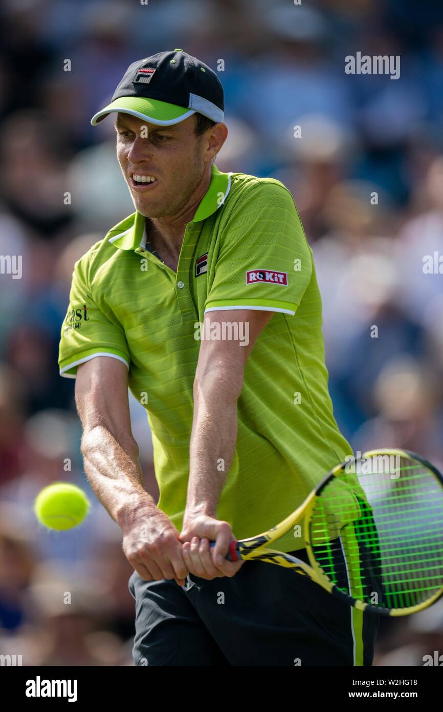 Sam Querrey of USA playing two handed backhand against Thomas Fabbiano of Italy at Nature Valley International 2019, Devonshire Park, Eastbourne - Eng Stock Photo