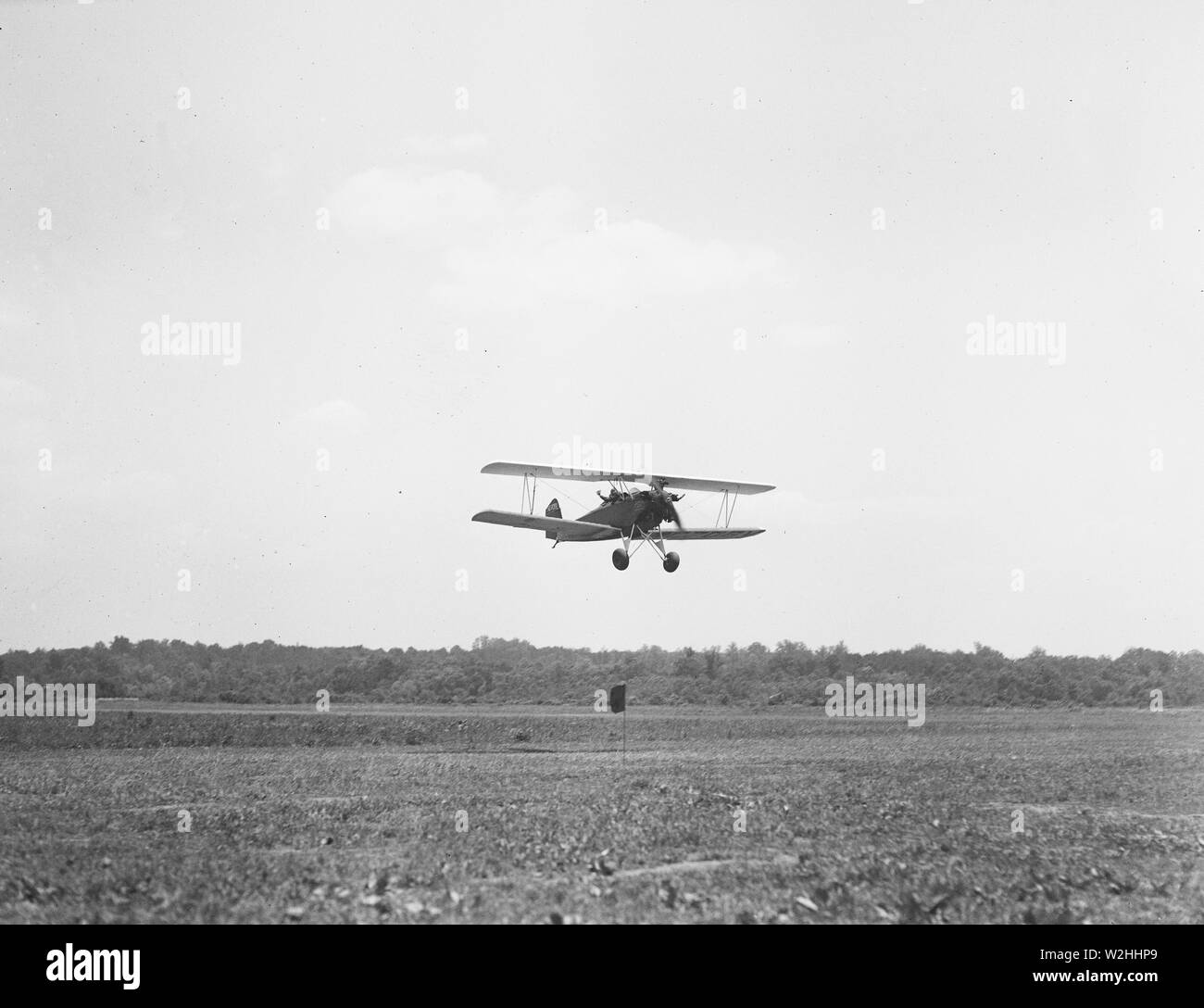 Aerial golf at College Park. Throwing ball from plane ca. 1934 Stock