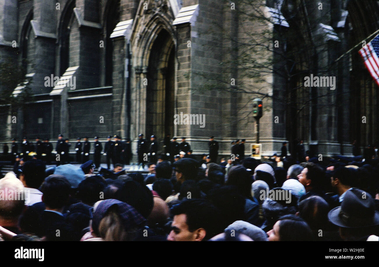 Crowds in New York City try to catch a glimpse of Pope Paul VI as he visits the city on October