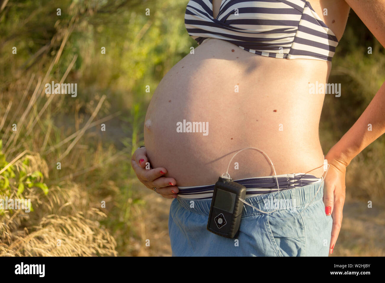 Mom in bikini hi-res stock photography and images - Alamy
