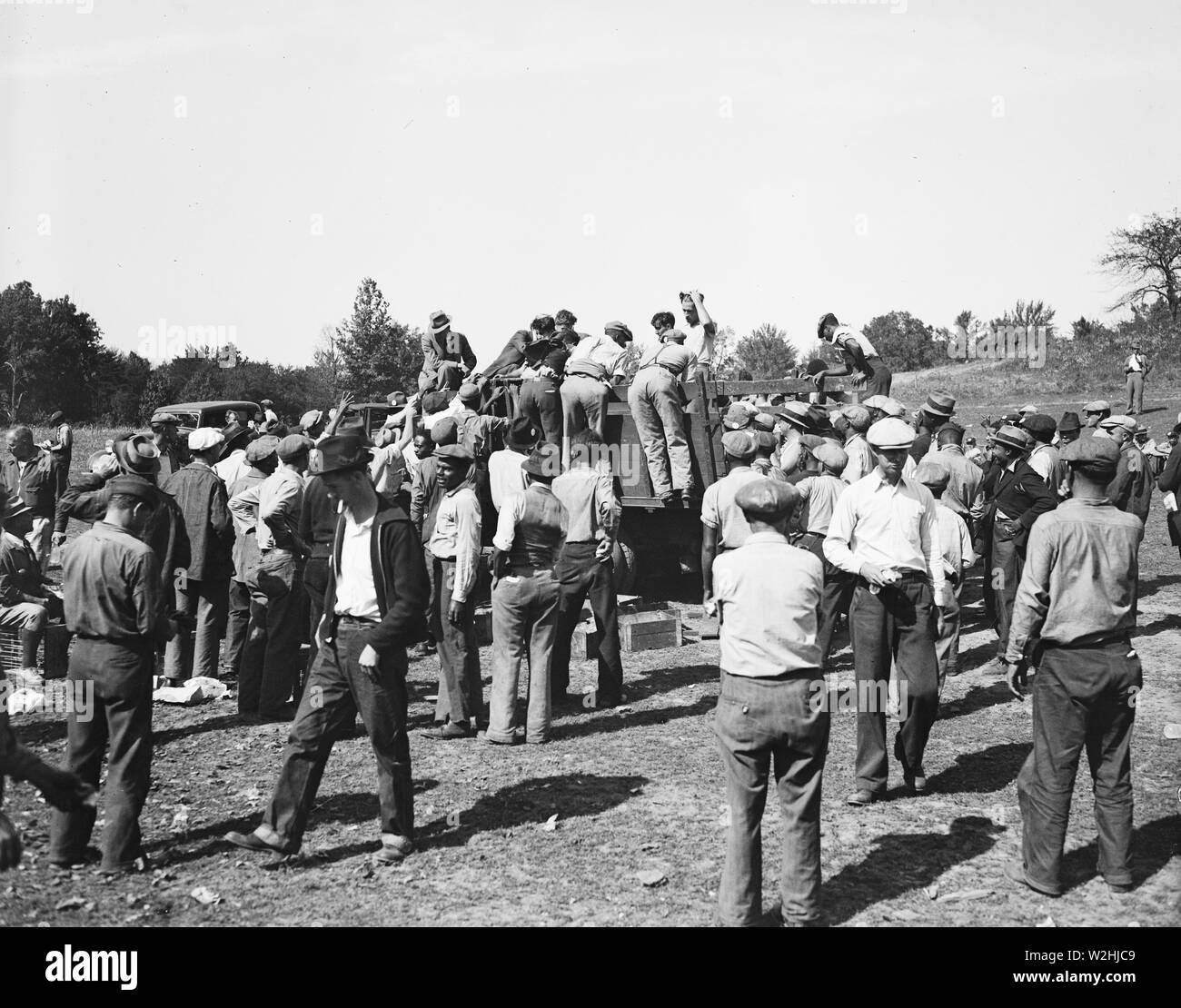 Workers at Tugwelltown (Greenbelt Maryland) take a lunch break ca. October 1935 Stock Photo