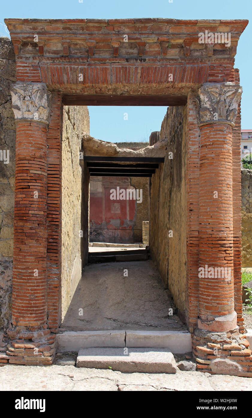 Old architecture tunnel entrance with red brick columns from Roman Empire time Stock Photo