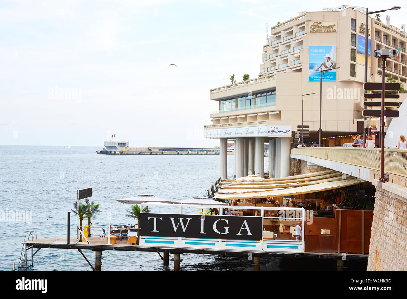 MONTE CARLO, MONACO - AUGUST 19, 2016: Twiga lounge and shisha bar terrace on the sea and Fairmont hotel in a summer day in Monte Carlo, Monaco. Stock Photo