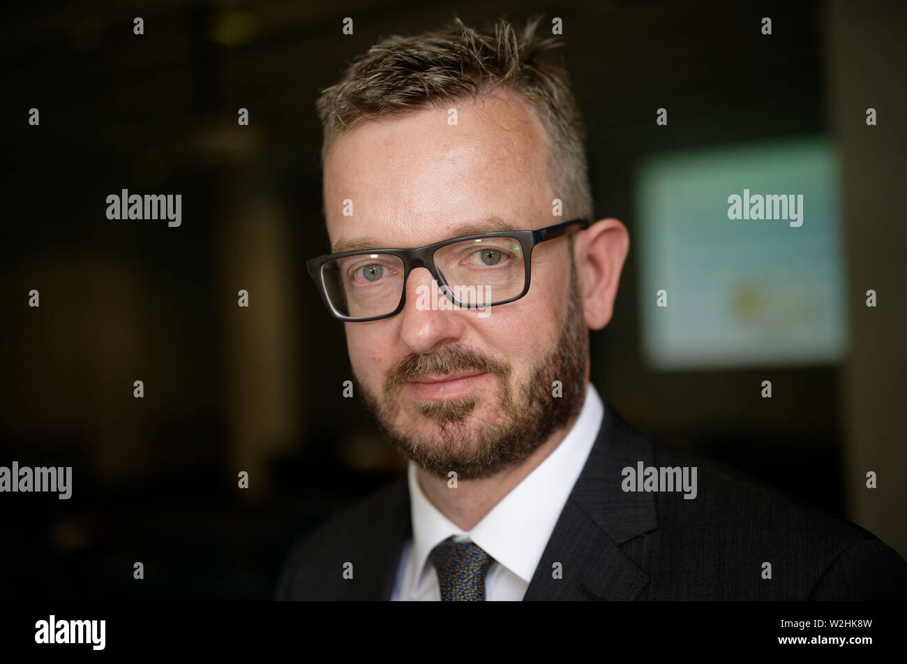 Cologne, Germany. 09th July, 2019. After a press conference on the annual report of the Financial Intelligence Unit (FIU), the head of the FIU, Christof Schulte, looks at the fact that the FIU is the federal anti-money laundering unit. Credit: Henning Kaiser/dpa/Alamy Live News Stock Photo
