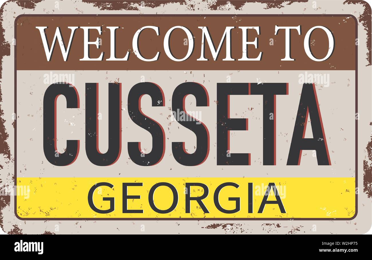 to Cusseta vintage rusty metal sign on a white