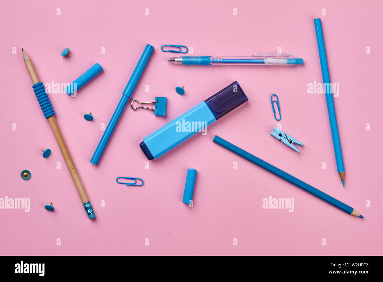 Blue school supplies on white background stock photo alamy