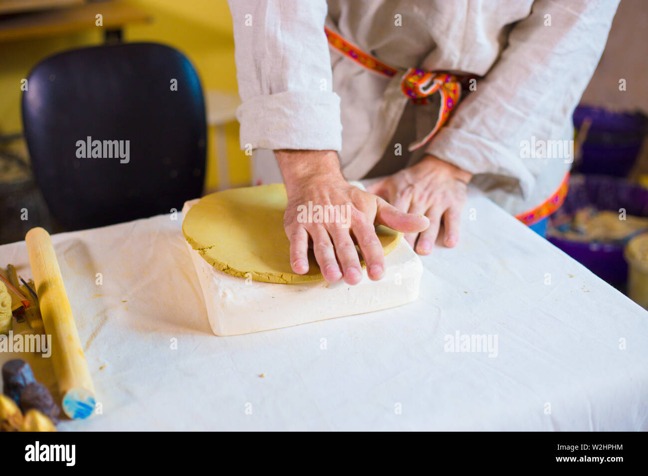 Potter making clay stamp picture Stock Photo Alamy