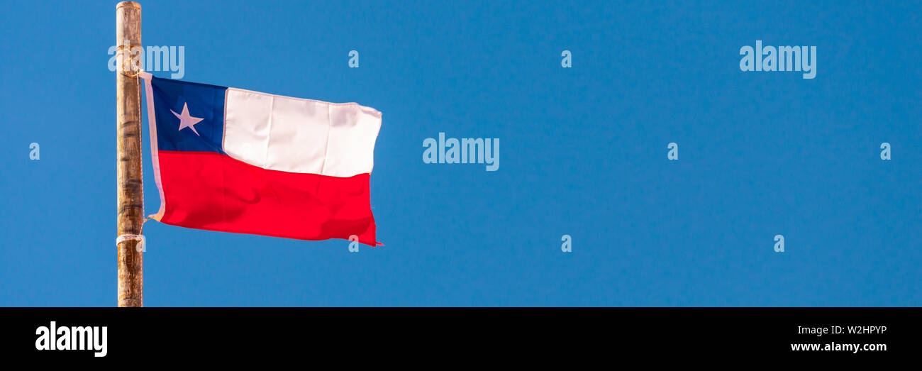 Chilean flag, blue sky panoramic background Stock Photo