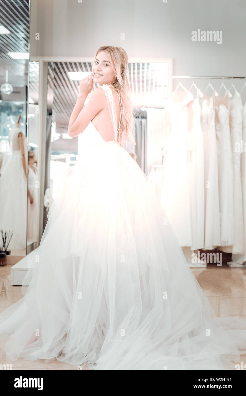 Laughing blonde wearing dress hi-res stock photography and images - Alamy