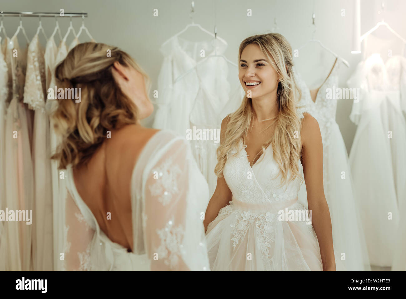 Two women in white dresses hi-res stock photography and images - Alamy
