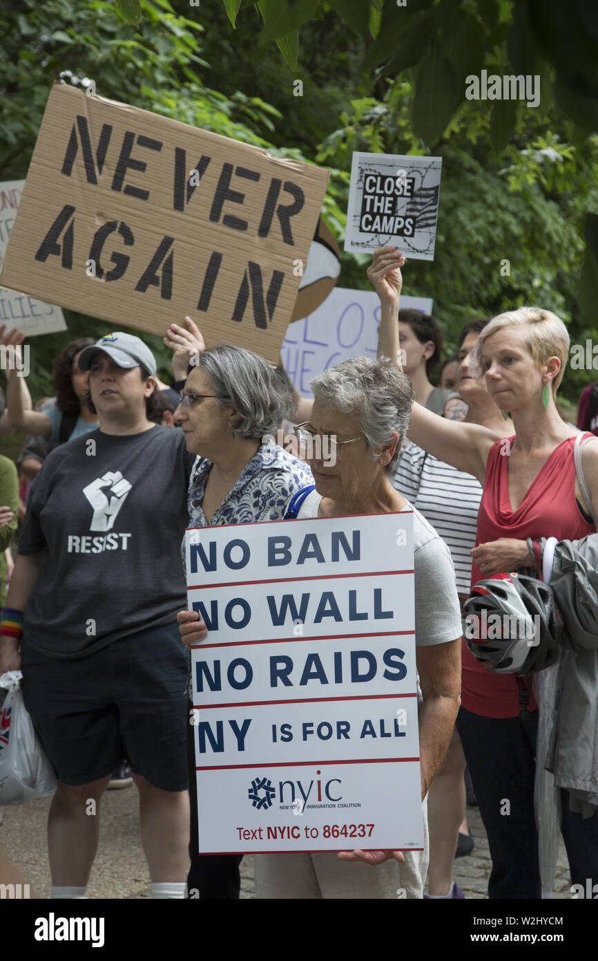 New Yorkers gather across the street from Senator Chuck Schumer's home in Park Slope, Brooklyn, NY on a national day of protest concerning the way asylum seekers, especially children are being treated in interment camps along the US Mexican Border. The government is not moving fast enough to alleviate the inhumane conditions there. They chanted 'Close the camps.' Stock Photo
