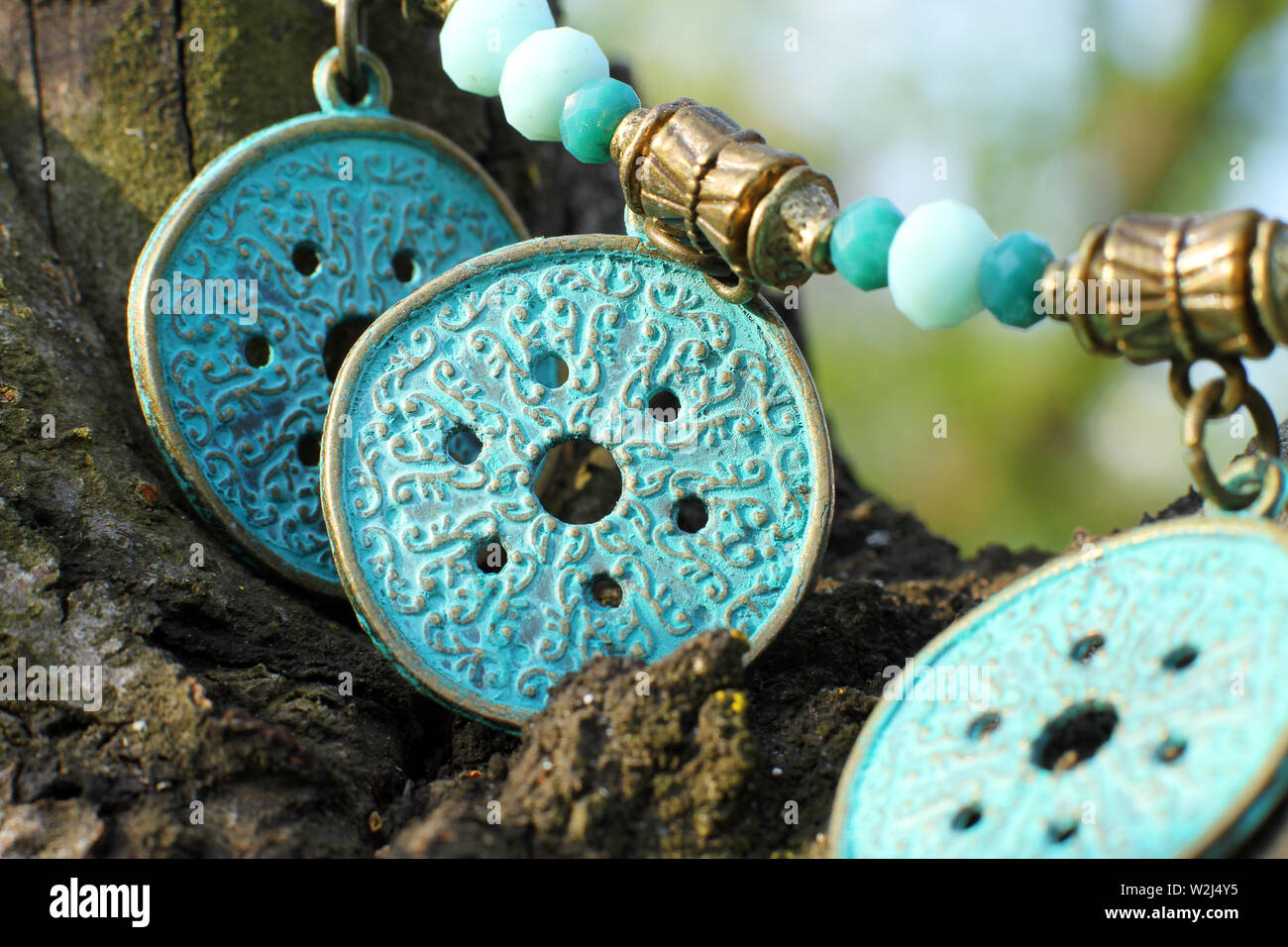 Handmade metal necklace on the nature background ethnical style Stock Photo