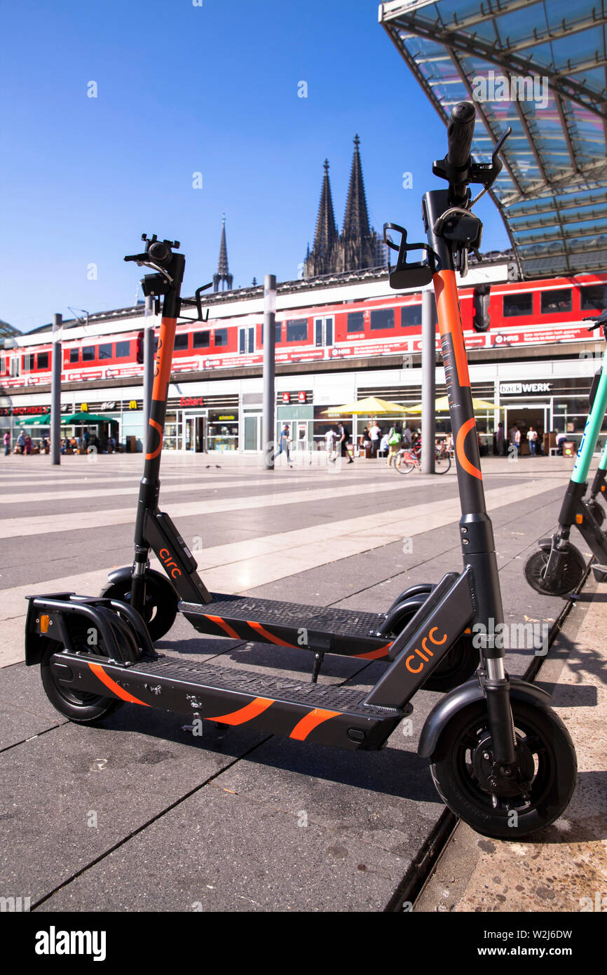 Circ electric scooters for rental at the main station, the cathedral, Cologne, Germany.  Circ Elektroscooter zum mieten am Hauptbahnhof, der Dom, Koel Stock Photo