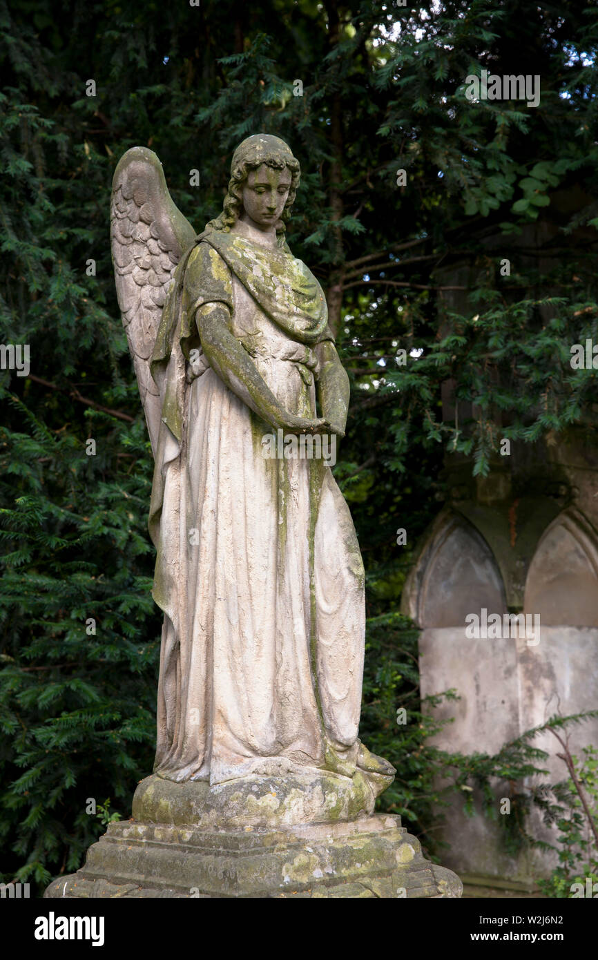 Germany, Cologne, angel at the Melaten cemetery.  Deutschland, Koeln, Engel auf dem Melatenfriedhof. Stock Photo