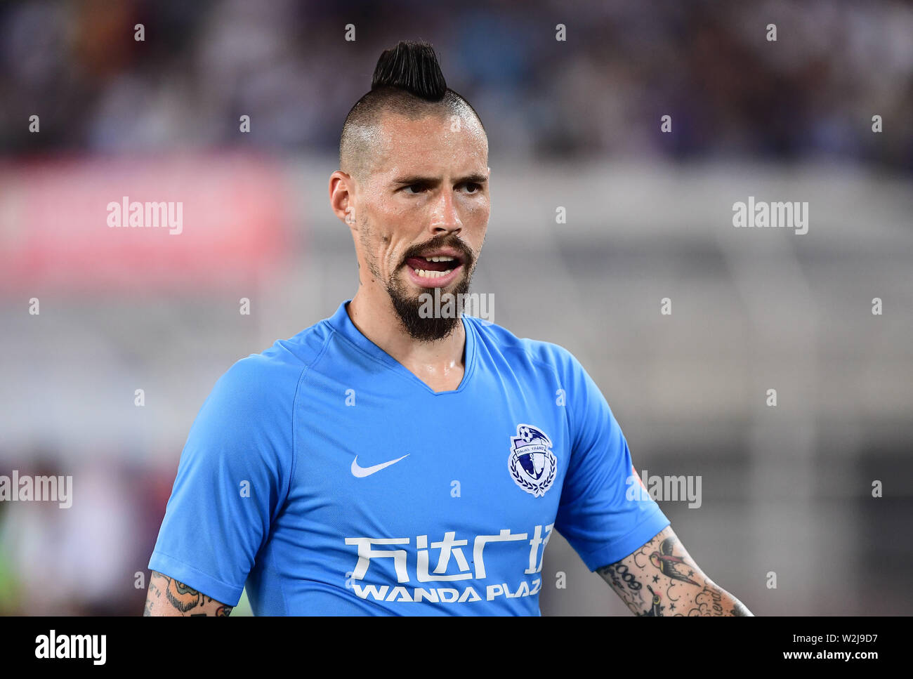 Slovak football player Marek Hamsik of Dalian Yifang reacts as he competes  against Henan Jianye in their 16th round match during the 2019 Chinese  Football Association Super League (CSL) in Dalian city,