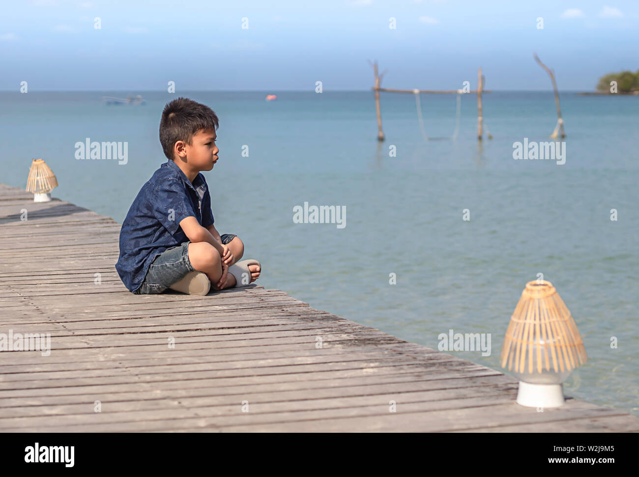 Asian boy fishing boat hi-res stock photography and images - Alamy