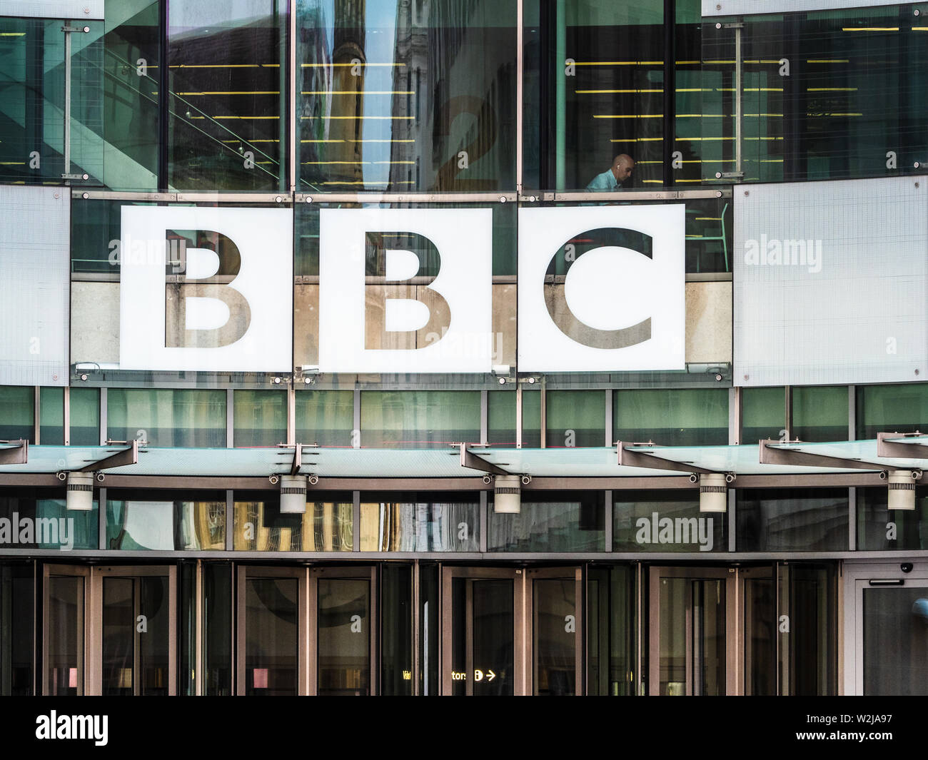 BBC HQ New Broadcasting House London - Sign outside Broadcasting House, the BBC HQ / BBC headquarters  Portland Place & Langham Place, Central London Stock Photo