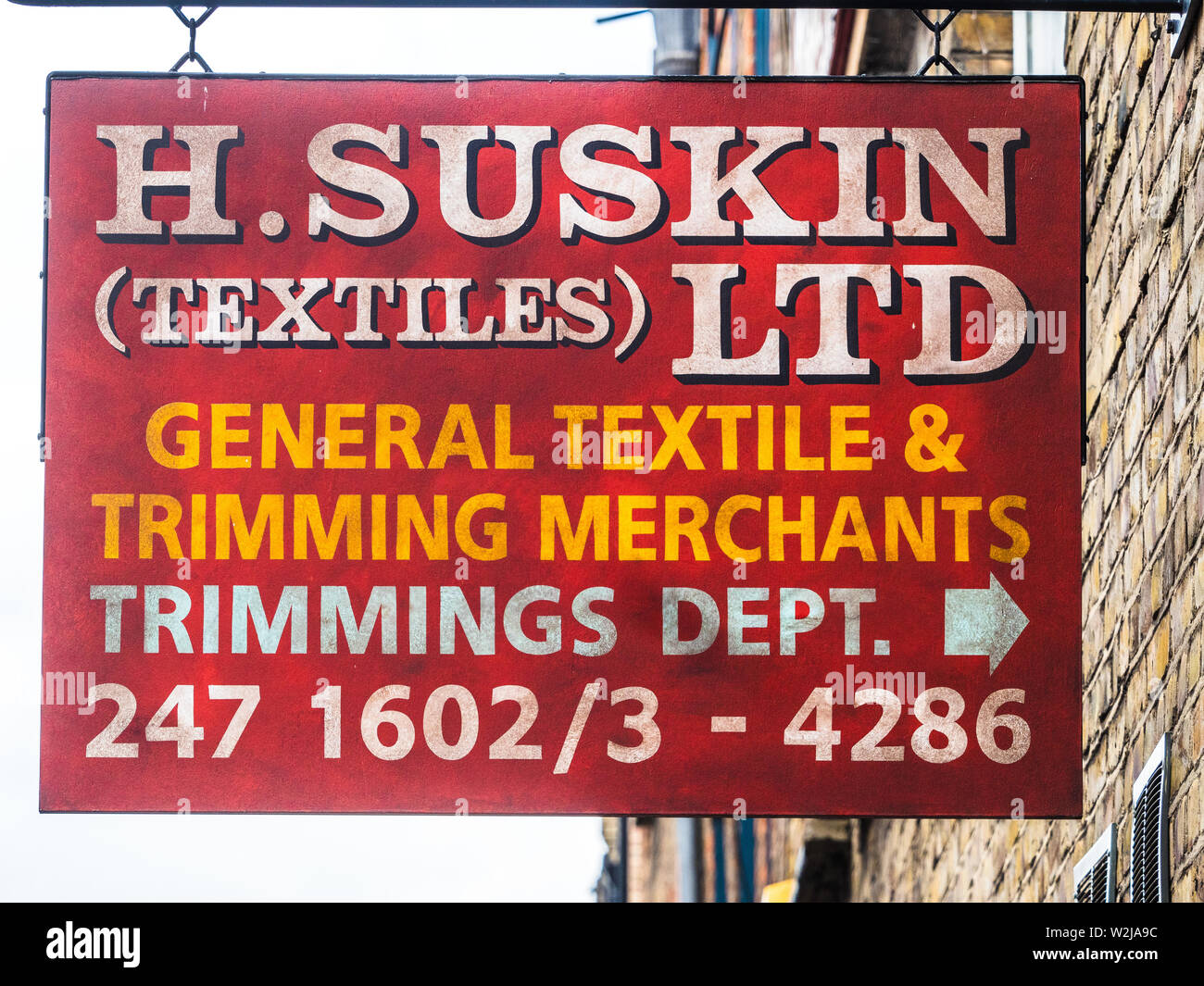 Vintage Sign in Spitalfields East London - H. Suskin Textiles Ltd Stock Photo